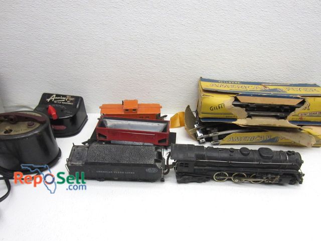 Lot 31-6382 - American Flyer Train Lot: Engine, Tender, Transformers (power on), Tracks