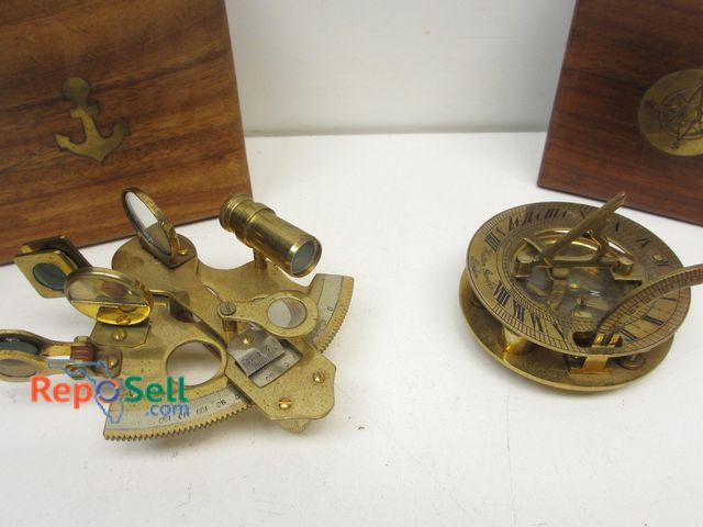 Lot 31-6038 - Brass nautical sextant and sundial in wood boxes