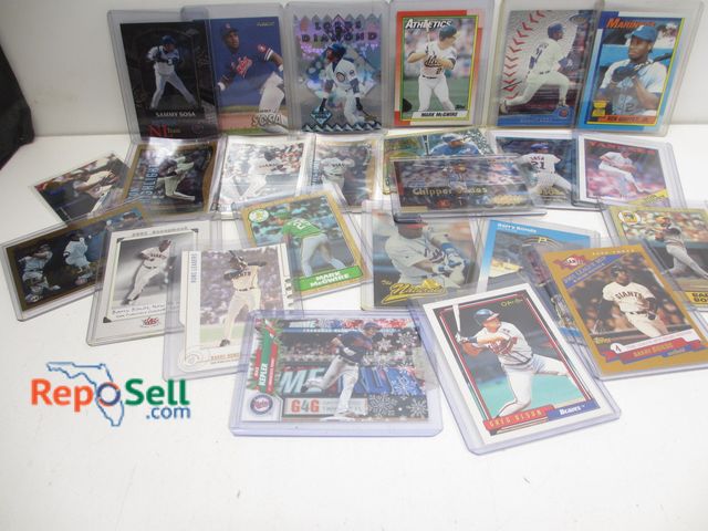 Lot 31-6023 - (24) baseball cards in sleeves: (7) Sosa, Guidry, (2) McGwire, (8) Bonds, etc.