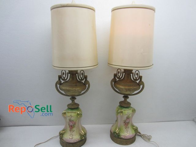 Lot 31-1195 - Two porcelain and brass lamps, both power on.
