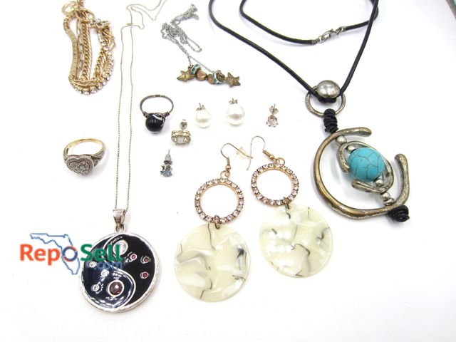 Lot 31-1007 - Jewelry Lot: .925 Heart Ring Size 6.75, .925 Chain, Topaz Earring - Mostly Costume