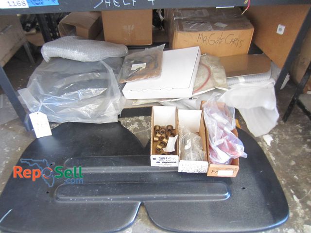 Lot 31-1169 - Contents of Shelf/Floor: Golf Cart Parts Including Epic Front Seat Back, TL LED Assembly, EZ Go RXV ...