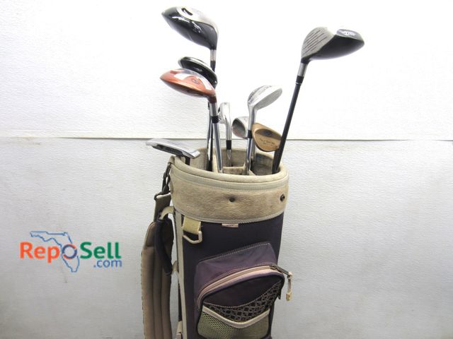 Lot 31-6228 - Golf Bag w/ 9 Clubs - TaylorMade, Great White, Paradise, Etc.