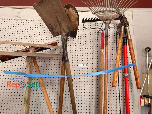 Lot 31-1124 - Yard Tools Hanging On A Pegboard Wall (pegboard not included) Includes A Variety Of Shovels, Rakes, ...