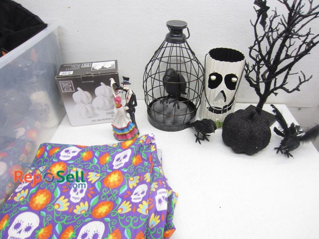 Lot 31-4237 - Halloween &amp; Day of the Dead Décor: Table Clothes, Ravens, Pumpkins, etc. - Tote Included