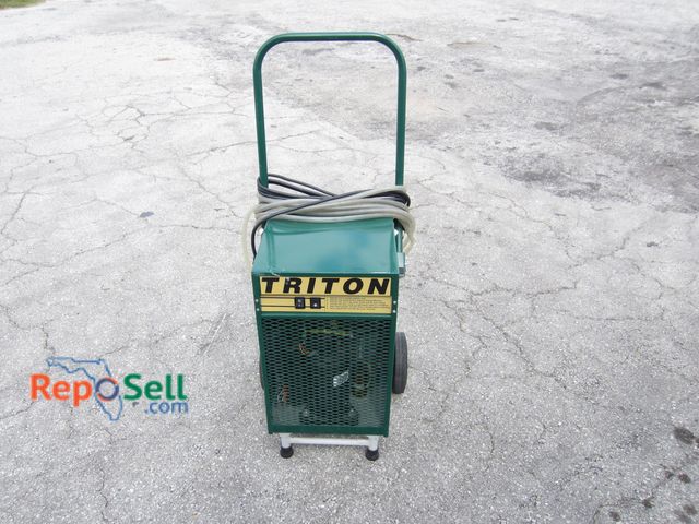 Lot 31-7490 - Triton Dehumidifier - Powers On