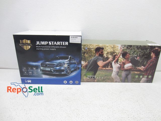 Lot 31-9439 - Bluetooth speaker and jump starter - both appear new in box.