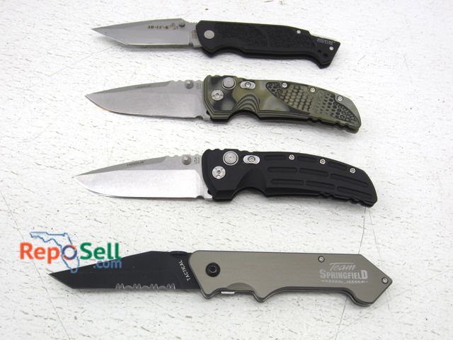 Lot 31-6282 - (4) Pocket Knives: Hogue, Rockloc, Team Springfield
