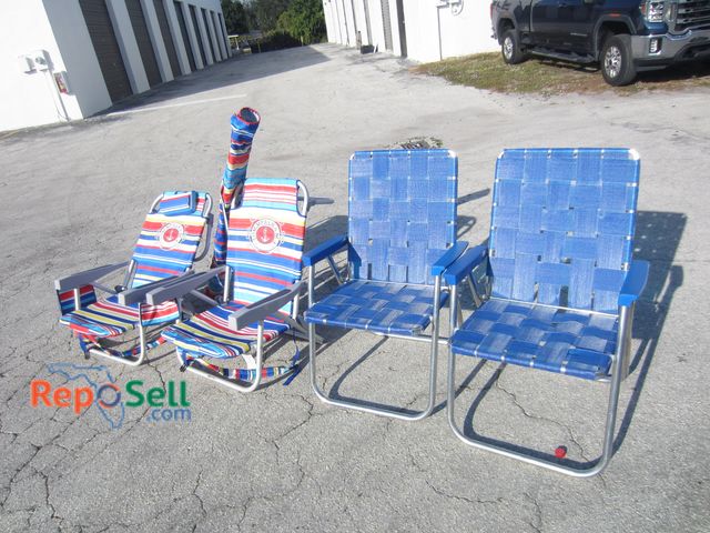 Lot 31-1224 - (4) Folding Beach Chairs and Umbrella: Tommy Bahama