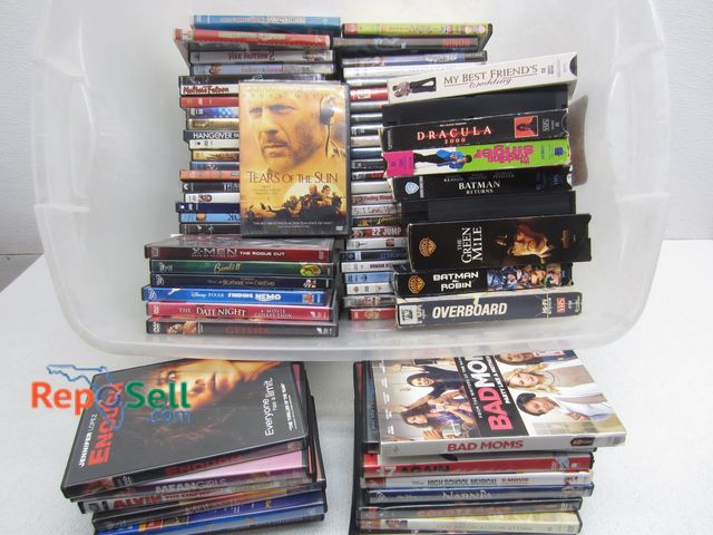 Lot 31-1202 - Large Lot of DVDs &amp; Some VHS: Mean Girls, Dracula, X-Men, Mulan 2, etc.