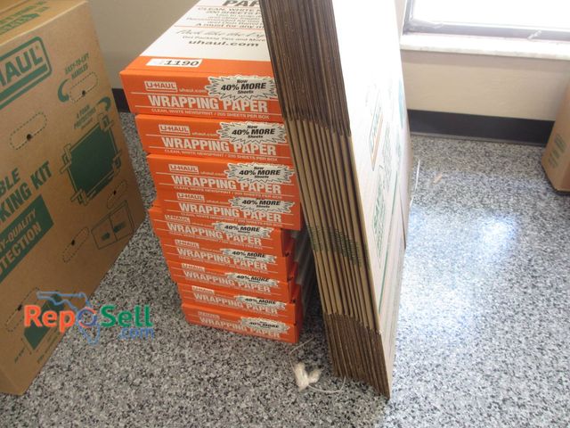 Lot 31-1190 - Nine New Packs Of U-Haul Brand Wrapping Paper And Medium Boxes. Wrapping Paper Boxes Are Sealed And ...