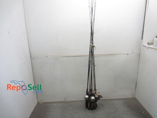 Lot 31-7123 - (8) Fishing Rods And (6) Reels With Stand: Shakespeare, Okuma, South Bend etc