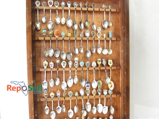 Lot 31-1062 - (50+) Silver Plate Spoon Collection in Large Wood Case; Case measures 28"x16" w/ Glass doors