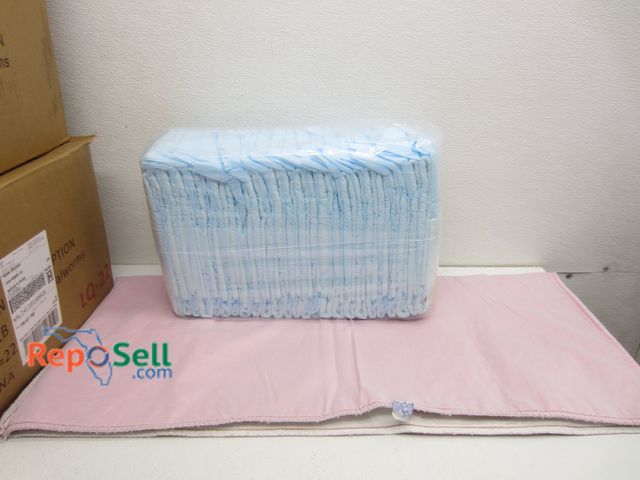 Lot 31-2053 - (75) Large Adult Briefs &amp; (12) Cloth Under Pads 33" x 29