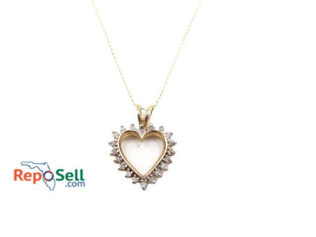 Lot 31-1014 - 10K Yellow Gold Diamond Pendant and Chain - 2.03g total