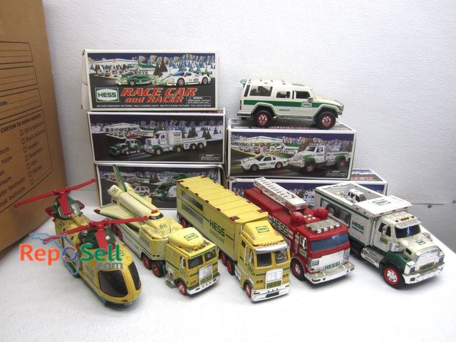 Lot 31-8328 - Large Box of Hess Vehicles: (5) Boxed, (12) Not Boxed - Helicopters, Firetrucks, etc.