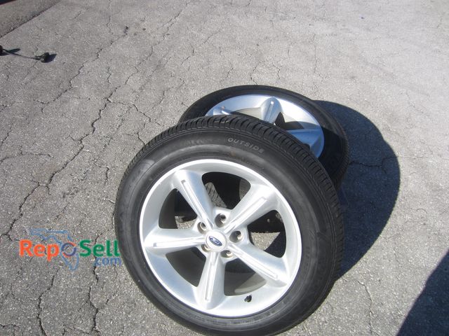 Lot 31-7569 - (2) Tires on Ford Stock Rims: 1- Falken, 1 - Geolander, BOTH-  225/60R18