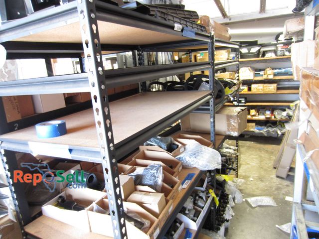 Lot 31-1071 - Two Heavy Duty Metal Shelving Units With Particleboard Shelves Approximately 48x24x71 Inches Each