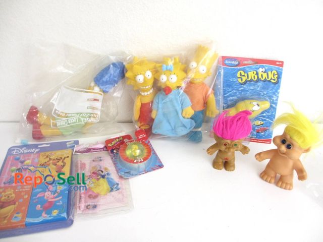 Lot 31-8546 - Vintage Toys: 1990 Simpsons Plush, Troll Dolls, Pokemon Ball, Disney Crayons