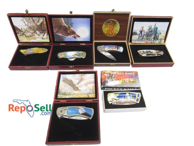 Lot 31-5410 - (6) Boxed Knives: Variety of Designs: Deer, USA, Wolves, etc.