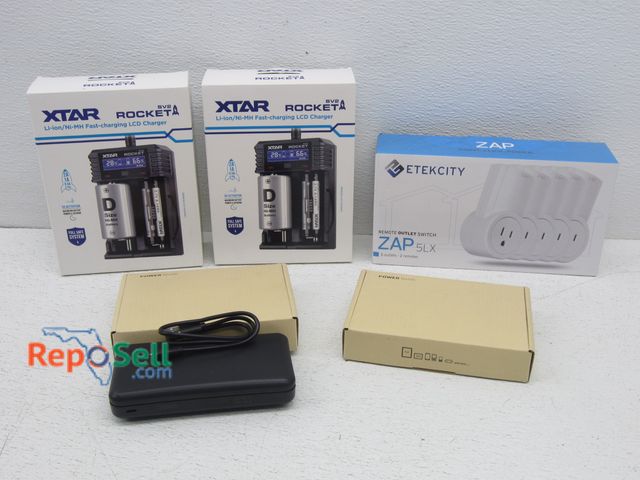 Lot 31-6284 - New ETEK Remote Outlet Switch, (2) New XTAR Chargers, (2) Phone Power Banks