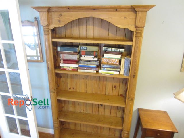Lot 31-9005 - Wooden Bookshelf With Decorative Pillars And Four Shelves, - Books not included  Approximate Height ...
