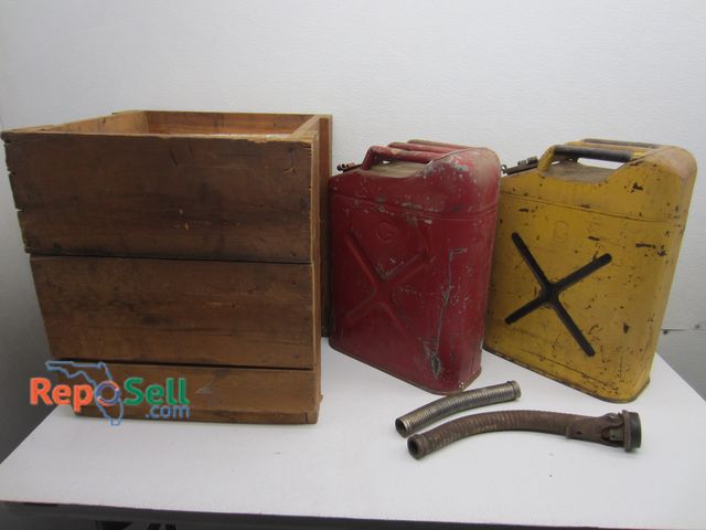 Lot 31-1133 - Two Vintage Gas Cans and Wood Crate