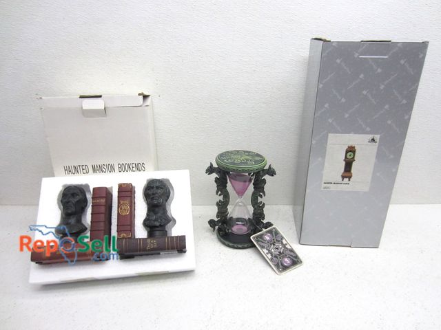 Lot 31-9187 - (3) Halloween Decor: Clock, Hour Glass, Bookends