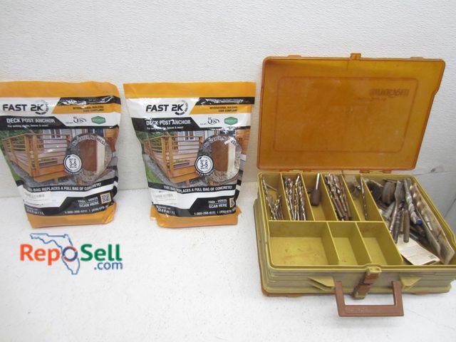 Lot 31-9416 - (2) new bags Fast 2k deck post anchor composite &amp; hardware bin with drill bits, etc.