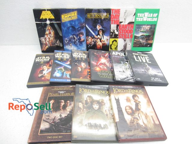 Lot 31-1309 - (5) VHS Tapes (3 Star Wars) &amp; (9) DVDs; Star Wars, Lord of the Rings, War of the Worlds, Etc.