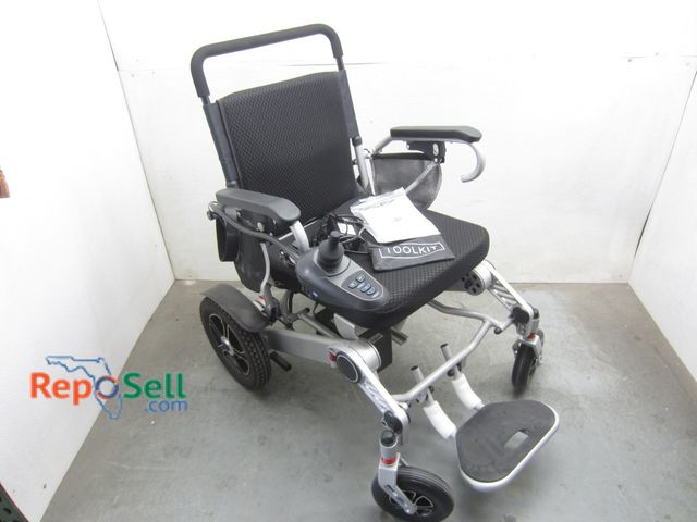 Lot 31-6393 - New Jiang Elite Motors Electric Wheelchair with Charger - Powers On/Works