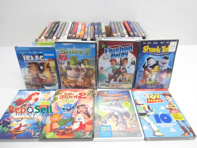 Lot 31-1062 - 43 Unopened Kid's DVDs (30 Disney, 8 DreamWorks, 5 Misc.)