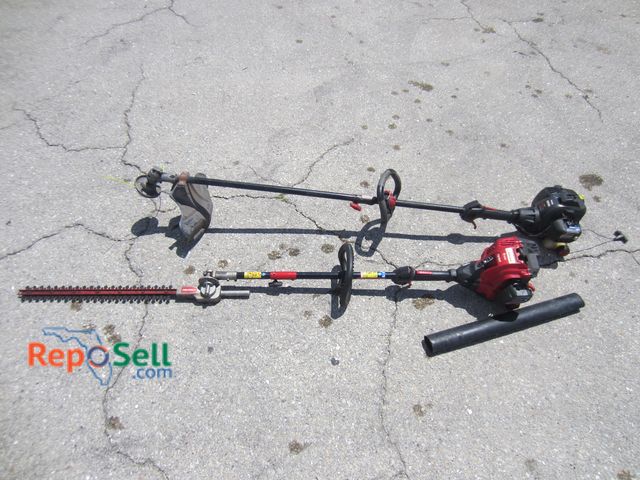 Lot 31-9227 - Troy-Bilt hedge trimmer &amp; Craftsman string trimmer, both have compression