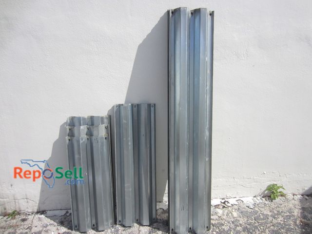 Lot 31-5354 - (42) Galvanized Steel Hurricane Shutters: (27) 6', (4) 42", (3) 38", (4) 35" And (4) 32"