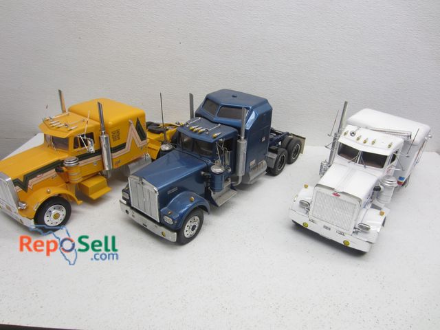 Lot 31-9235 - (3) Assorted Truck Cabs 1:18 Scale