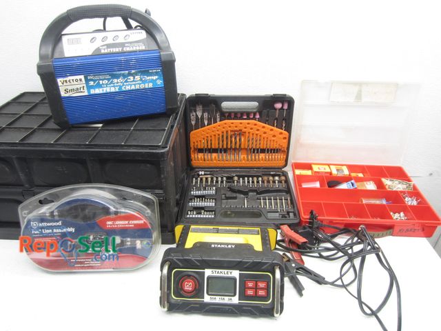 Lot 31-9458 - (2) Battery Chargers (power on), Drill Bit Set, Organizer with Tote