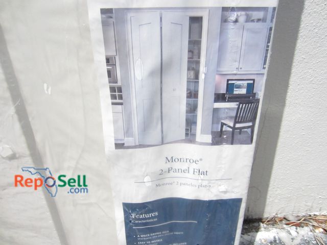 Lot 31-1117 - New Munro two-panel closet door, 80 inches by 36 inches