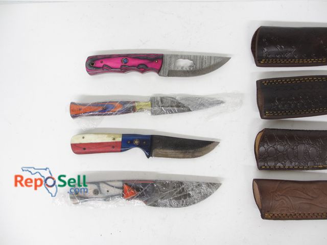 Lot 31-7077 - (4) Damascus-style knives with sheaths