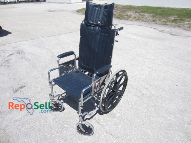 Lot 31-1179 - High back traveler reclining wheelchair, 20 inches by Everest and Jennings