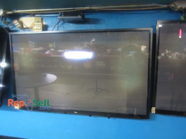 Lot 31-2016 - 60" LG TV - Powers On - BUYER MUST REMOVE/BRING LADDER/TOOLS