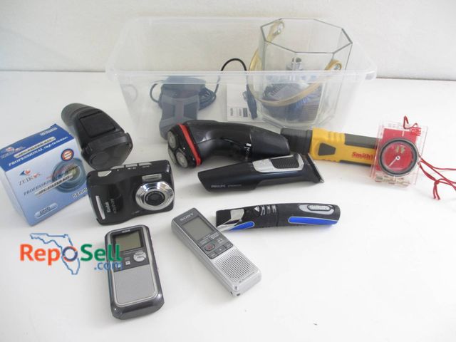 Lot 31-8550 - Electronics Including Kodak Camera, Philips Shavers, Digital Voice Recorders, And Smith's Tool