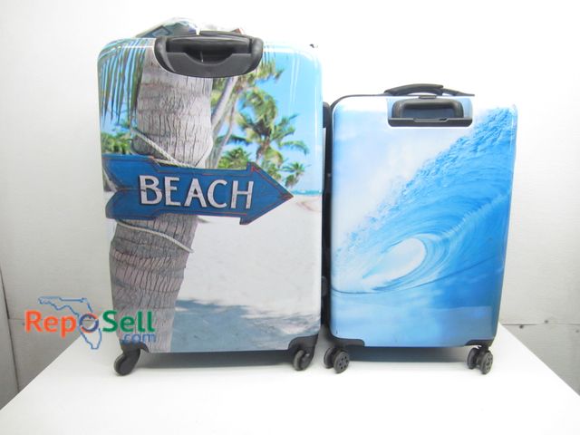 Lot 31-5335 - (2) Rolling Hard Suitcases &amp; New Travel Tags