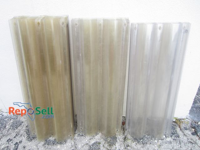 Lot 31-1103 - Transparent/Clear Storm Shutters: (13) 36", (8) 35", (6) 34"