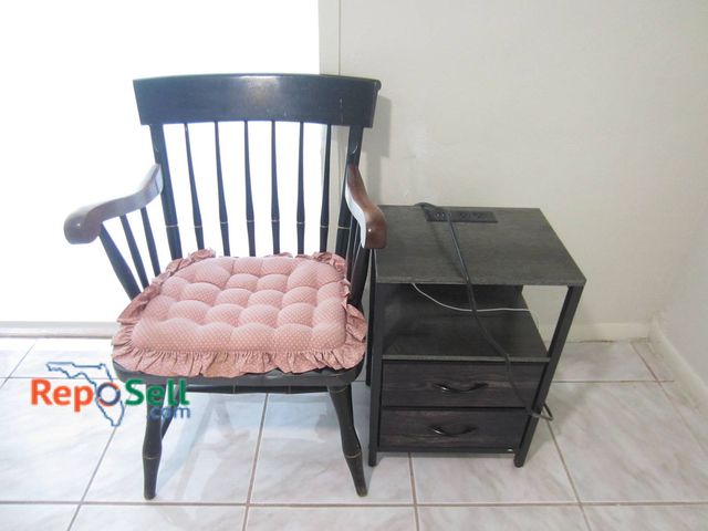 Lot 31-8610 - Georgetown University Wooden Armchair With Pink Cushion And Modern Two-Drawer Side Table With Power ...