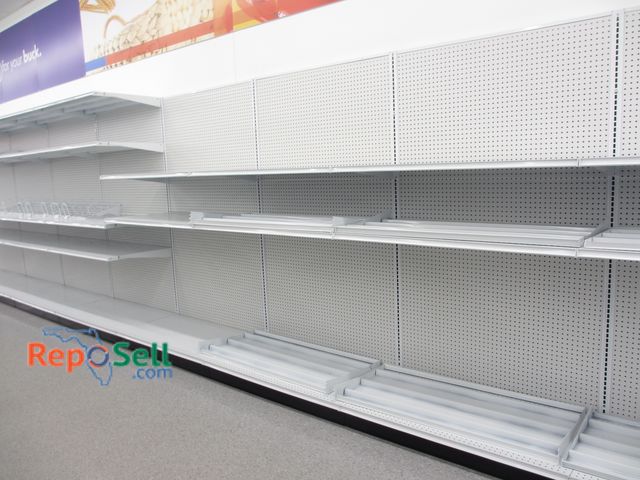 Lot 31-3060 - (8) 4' Sections of Peg Board &amp; Madix Shelving. 85"H x 26"W. Buyer Must Remove.