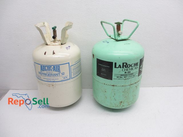 Lot 31-9406 - (2) Cans Of Refrigerant: 20lb R-22 And 10lb R-12