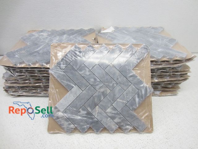 Lot 31-9296 - (28) Pieces Satori herringbone marble mosaic tiles