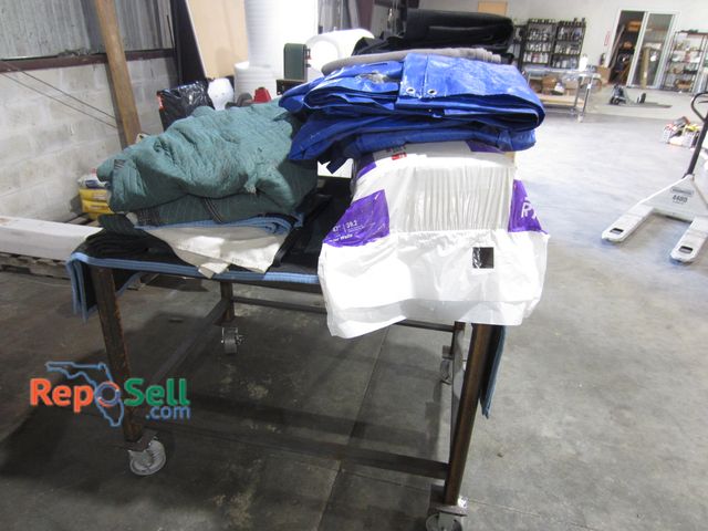 Lot 31-8224 - Rolling Metal Work table with moving blankets, tarps, Insulation 36" x 48" x 38"