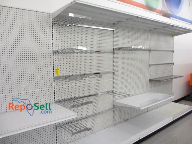 Lot 31-3056 - Peg Board Shelving Unit &amp; Brackets 194"L x 85" x 26" W. Buyer Must Remove.