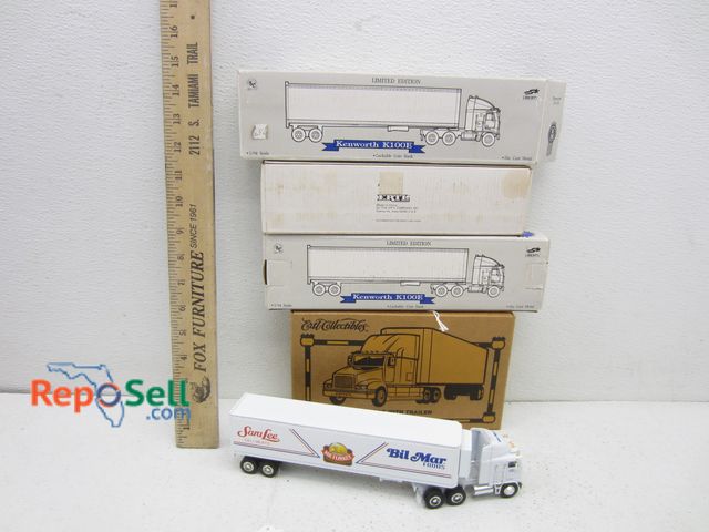 Lot 31-4188 - (4) Die Cast Metal Trucks With Original Boxes: ERTL, Kenworth, Sara Lee etc
